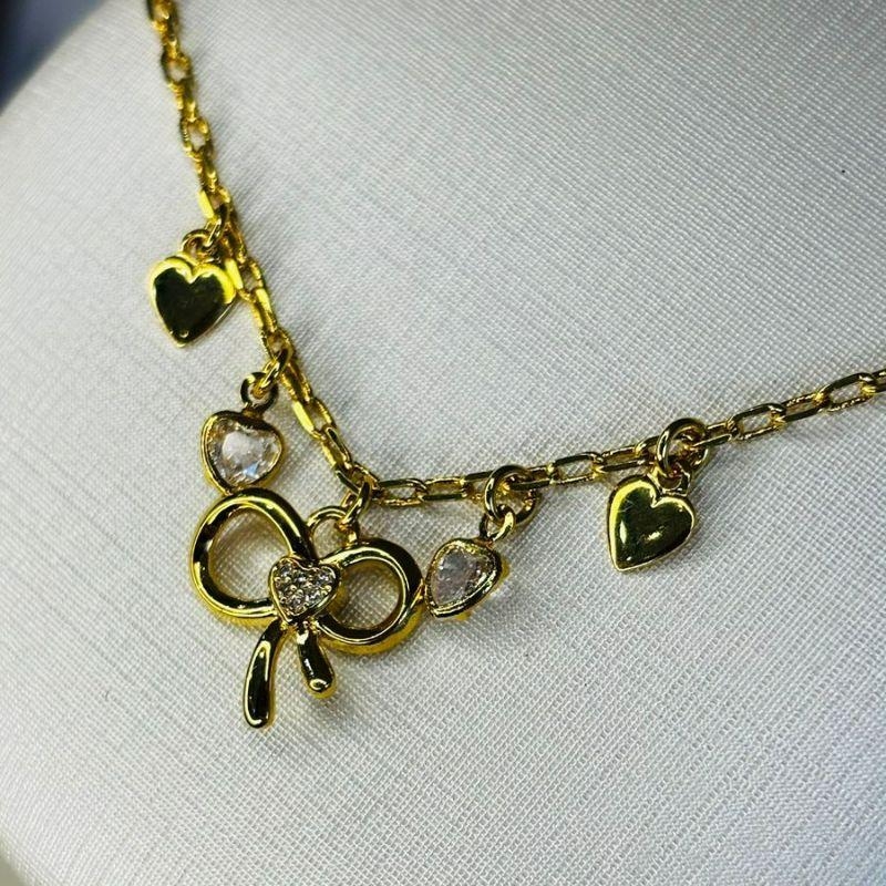 Pulseira laço com corações e pontos de luz